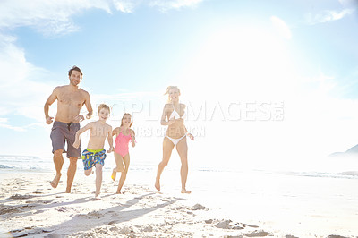 Buy stock photo Portrait, beach and family running with happiness, weekend break and bonding together with holiday. Parents, mother or father with children, kids and seaside for vacation, fun or travel with sunshine