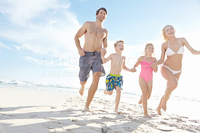 Buy stock photo Running, freedom and happy family holding hands at a beach for summer, fun and bonding in nature on vacation. Travel, energy and excited kids with parents at sea for holiday, celebration and games