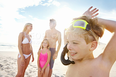 Buy stock photo Happy, family and kids with goggles relax on beach for snorkeling, adventure and happiness on vacation. Child, smile and parents with girl on holiday in Florida, summer or excited for swimming in sea