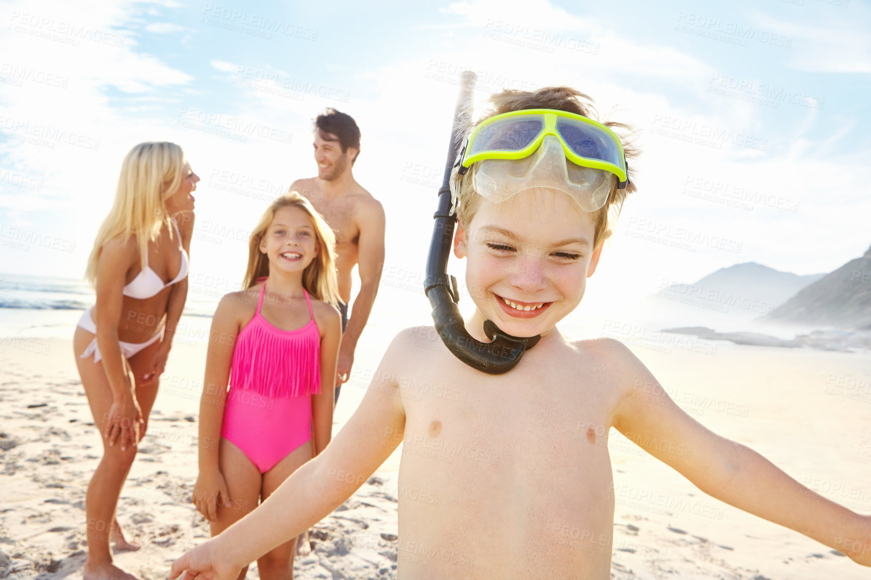 Buy stock photo Happy, family and children with goggles on beach for snorkeling, adventure and freedom on vacation. Kid, smile and parents with girl on holiday in Florida, summer or excited for swimming in sea