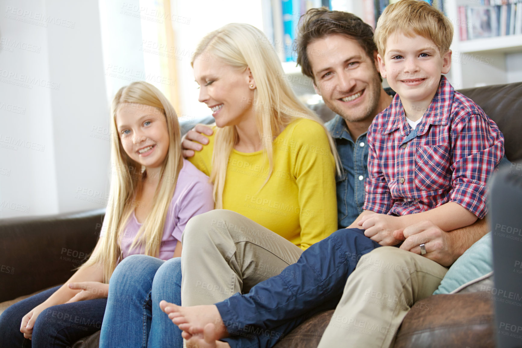 Buy stock photo Happy family, portrait and love on sofa in home with bonding, confidence and resting on weekend. Parents, children and smile on couch in living room with relax, care or comfortable in lounge of house