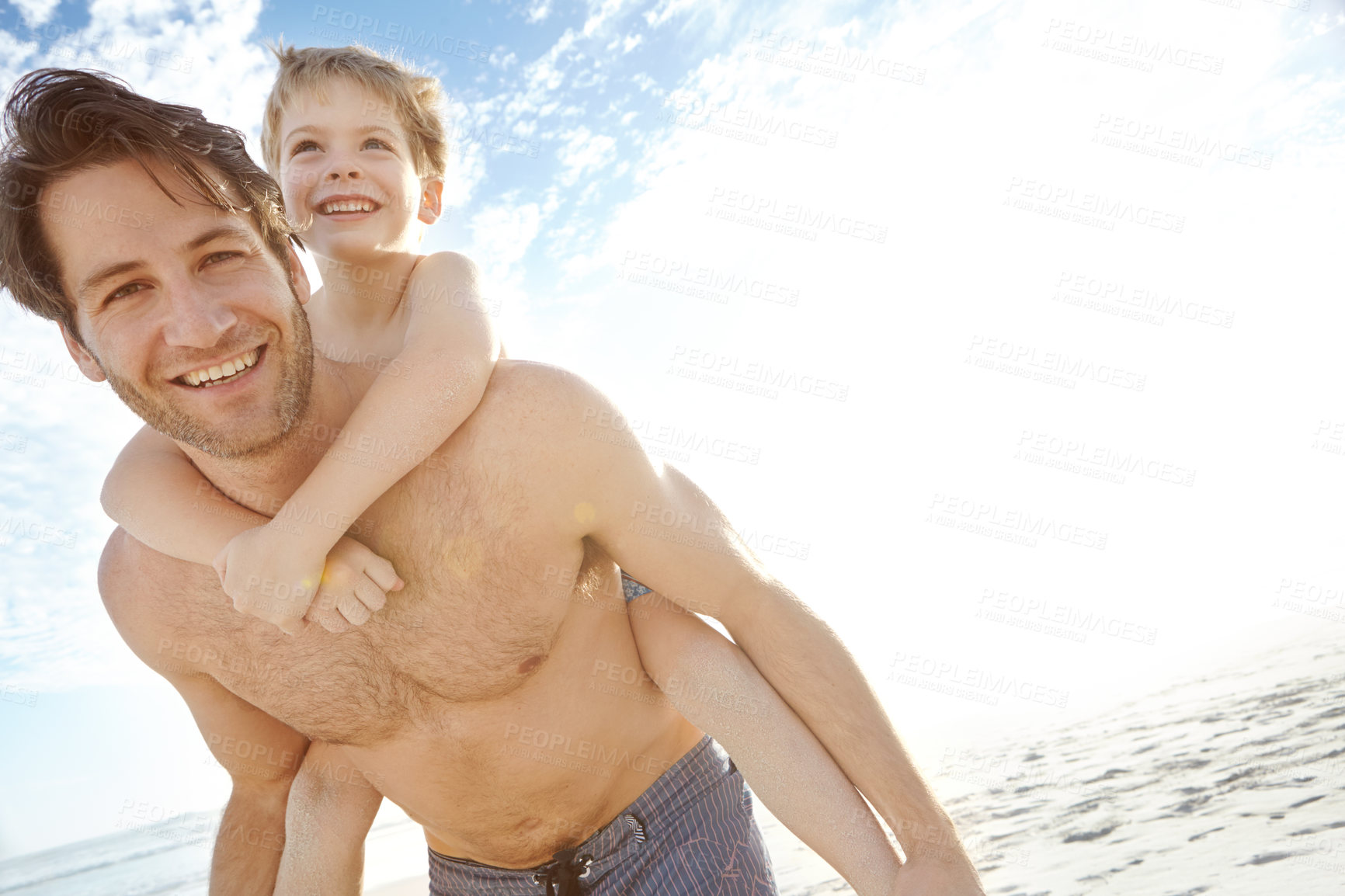 Buy stock photo Father, boy and happy in beach with piggyback on holiday in summer, bonding and support in Miami. Parent, kid and smile or excited with fun at seaside on vacation, trip and travel on portrait