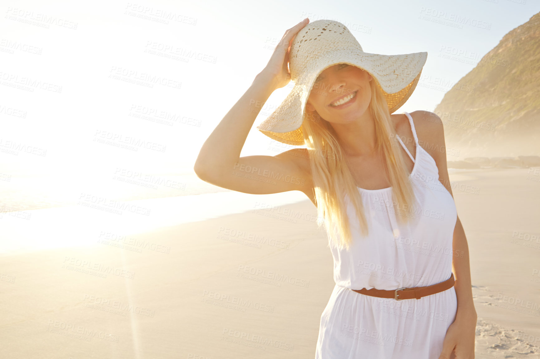 Buy stock photo Sunset, woman and portrait on beach with smile for walk, travel and adventure or vacation in nature. Female person, journey and happy with pride for holiday, summer and sunshine on island in Bali