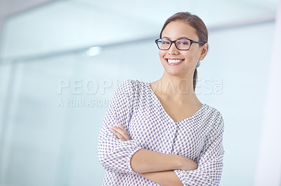 Buy stock photo Portrait of an attractive young woman standing in an office