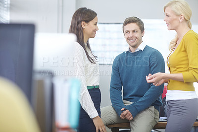 Buy stock photo Break, business people and smile in office for discussion, conversation and good news on startup project. Creative agency, women and man with happiness for teamwork, announcement and feedback