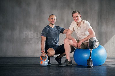 Buy stock photo Physiotherapy, kettlebell and man with disability for fitness, training and muscle strength with coach for support. Amputee, exercise ball and physiotherapist for physical rehabilitation with workout