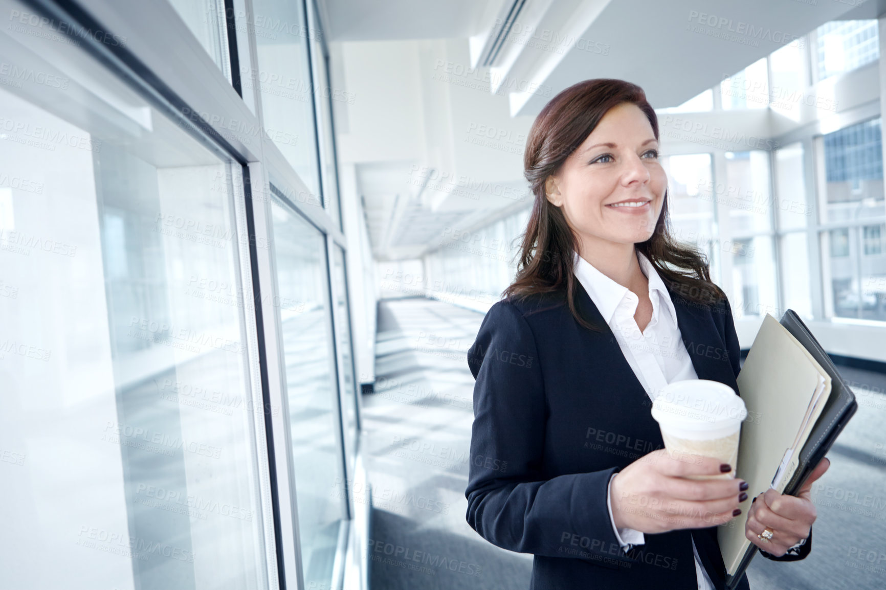 Buy stock photo Coffee, beverage and businesswoman in office with documents, smile or report at legal consultancy. Drinking tea, happy advisor or confident lawyer walking with files, folder and paperwork in law firm