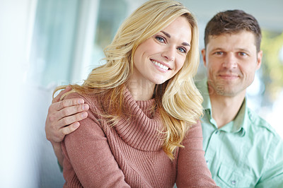 Buy stock photo Portrait, love and happy couple in house for relax, care and bonding together in living room. Face, man and smile of woman on sofa with partner for support, connection or healthy relationship in home