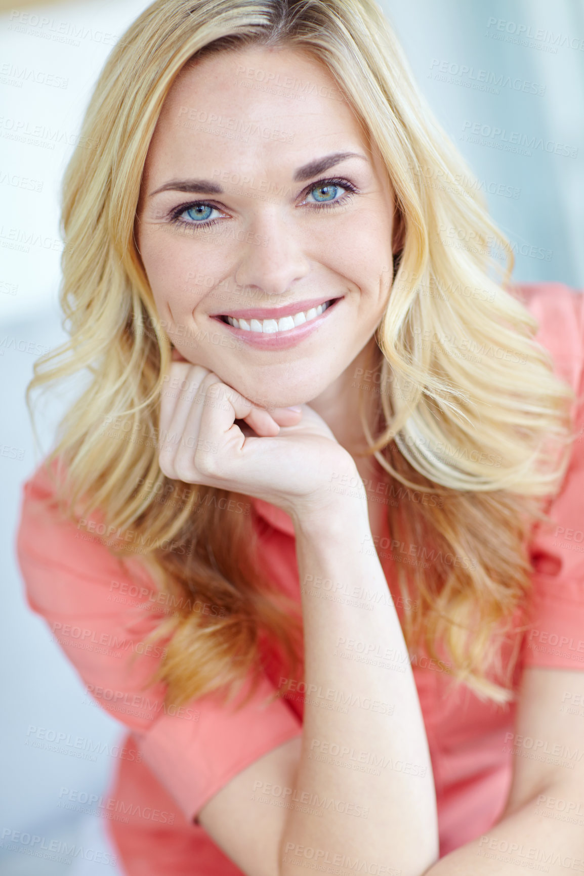 Buy stock photo Portrait of a beautiful young woman smiling and feeling cheerful at home