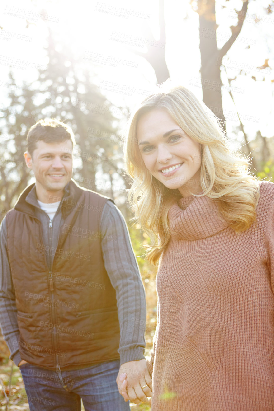 Buy stock photo Happy man, woman and portrait in forest for holding hands and adventure or love in woods or park. Couple, smile and together in nature for outdoor date, travel and romance in morning for anniversary 