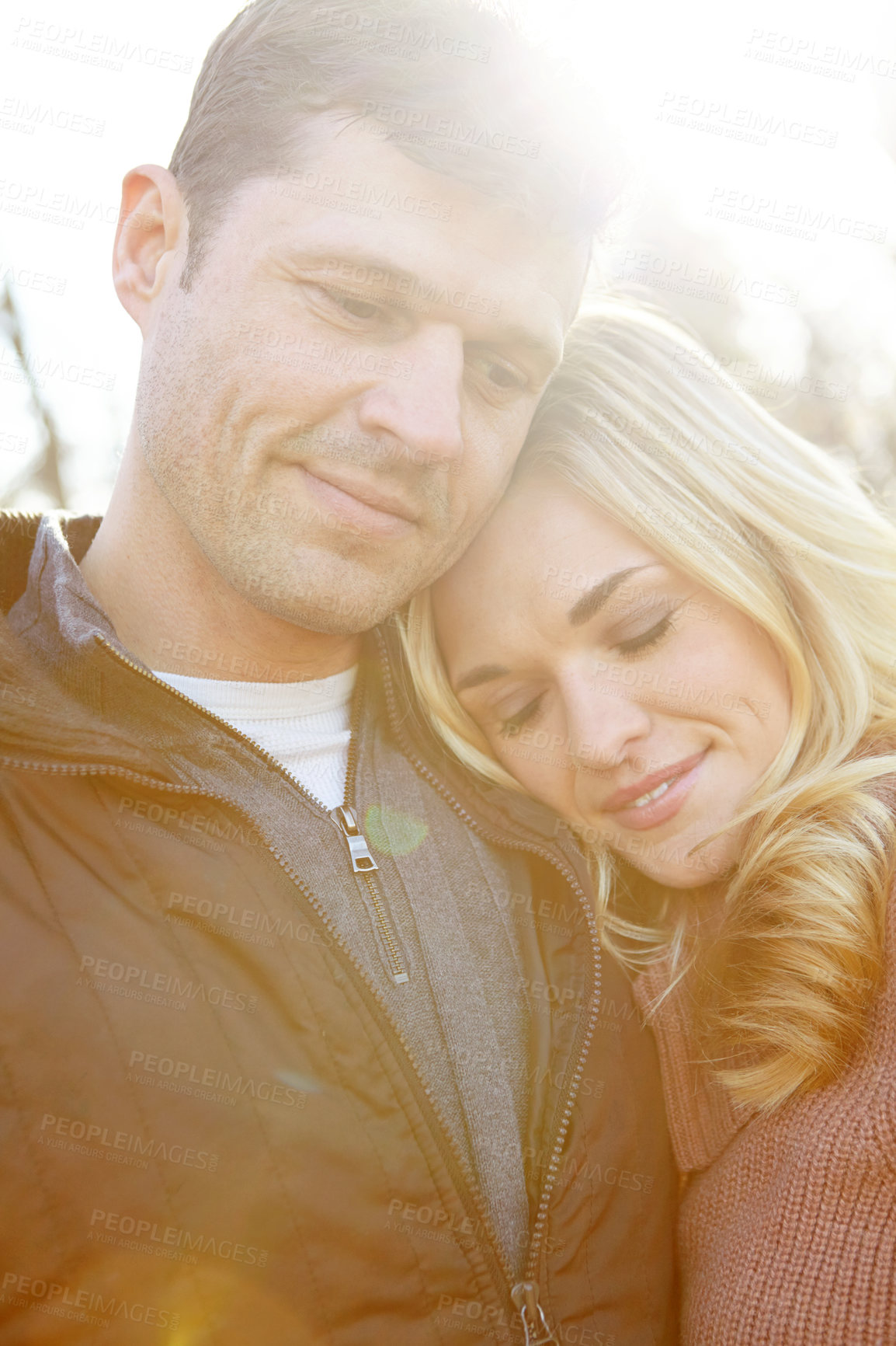 Buy stock photo Hug, couple and love in nature with support for adventure and date in park or countryside. Man, woman and smile or together for embrace, relax and happy in morning for anniversary, care or wellness