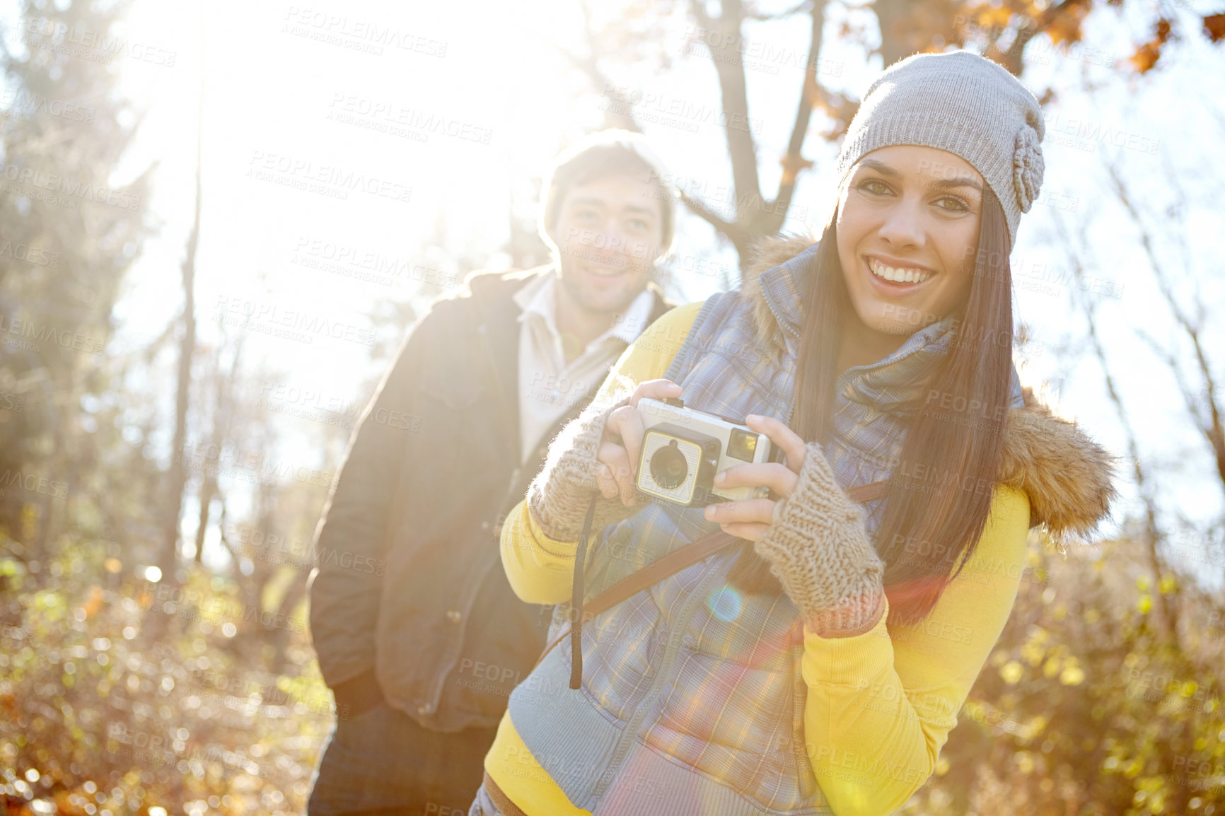 Buy stock photo Couple, happy and camera for photography outdoor with adventure travel, explore nature and sightseeing memory. Smile, woman and man with vintage tech of bonding, picture together or location scenery 