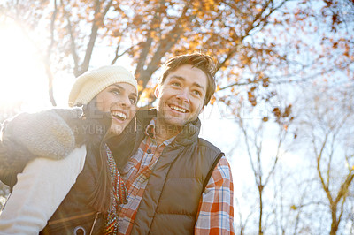 Buy stock photo Woman, man and hug with nature for countryside trip, bonding and travel in winter forest. Smile, love and happy couple in embrace for morning holiday, vacation or woods picnic or hiking adventure