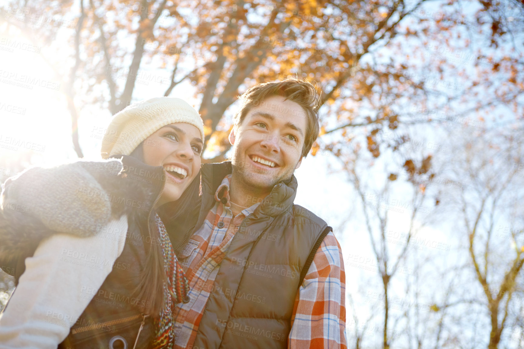 Buy stock photo Woman, man and hug with nature for countryside trip, bonding and travel in winter forest. Smile, love and happy couple in embrace for morning holiday, vacation or woods picnic or hiking adventure