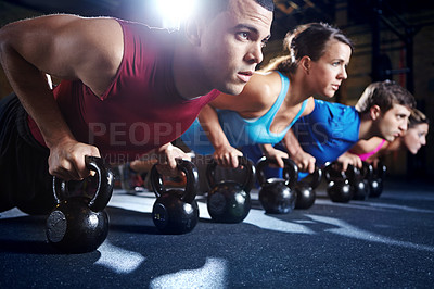 Buy stock photo People, gym and push up with kettlebell for workout or exercise for balance, coordination and strength building. Weights, physical cardio and stability for core, muscles and training for fitness.