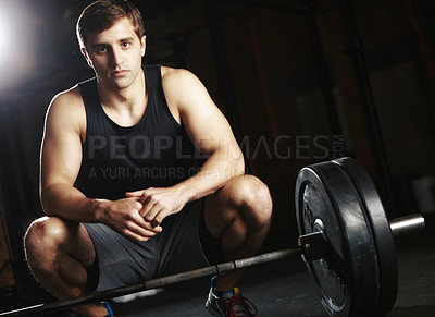 Buy stock photo Man, portrait and barbell in gym for fitness with mission or challenge for workout and muscle development. Athlete, face and strong mindset with iron weights for exercise, health and wellness goals