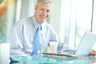 Buy stock photo Smile, laptop and portrait of mature businessman in office with online research for profit evaluation. Happy, coffee and financial manager work on report for company revenue policy with investment.