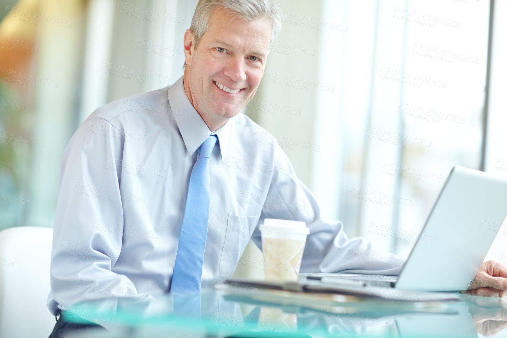 Buy stock photo Smile, laptop and portrait of mature businessman in office with online research for profit evaluation. Happy, coffee and financial manager work on report for company revenue policy with investment.