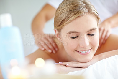 Buy stock photo Massage, smile and wellness with woman at spa as customer on table for break, pamper or treatment. Luxury, peace and relax with happy person on bed as salon client for comfort or stress relief