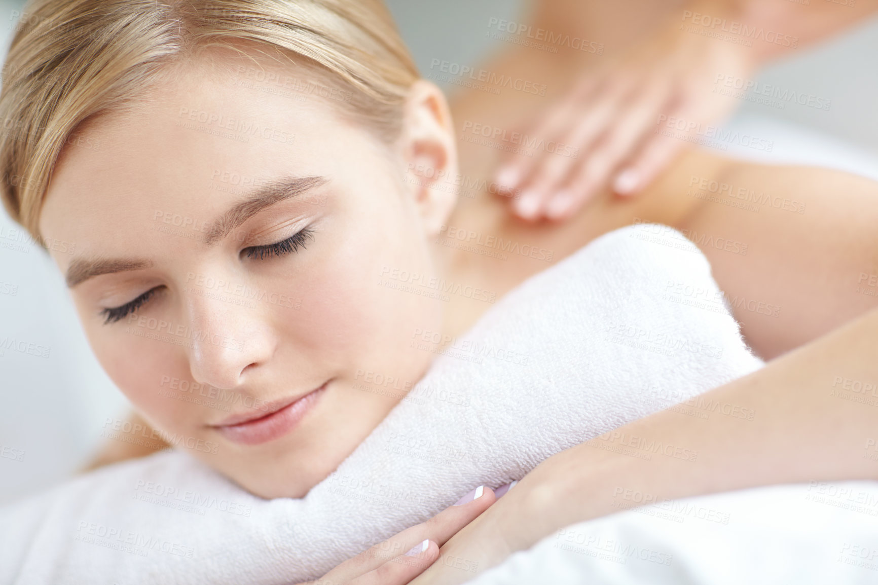 Buy stock photo Massage, quiet and relax with woman at spa as customer on table for break, treatment or wellness. Calm, luxury and pamper with person on bed as salon client for comfort or stress relief with smile