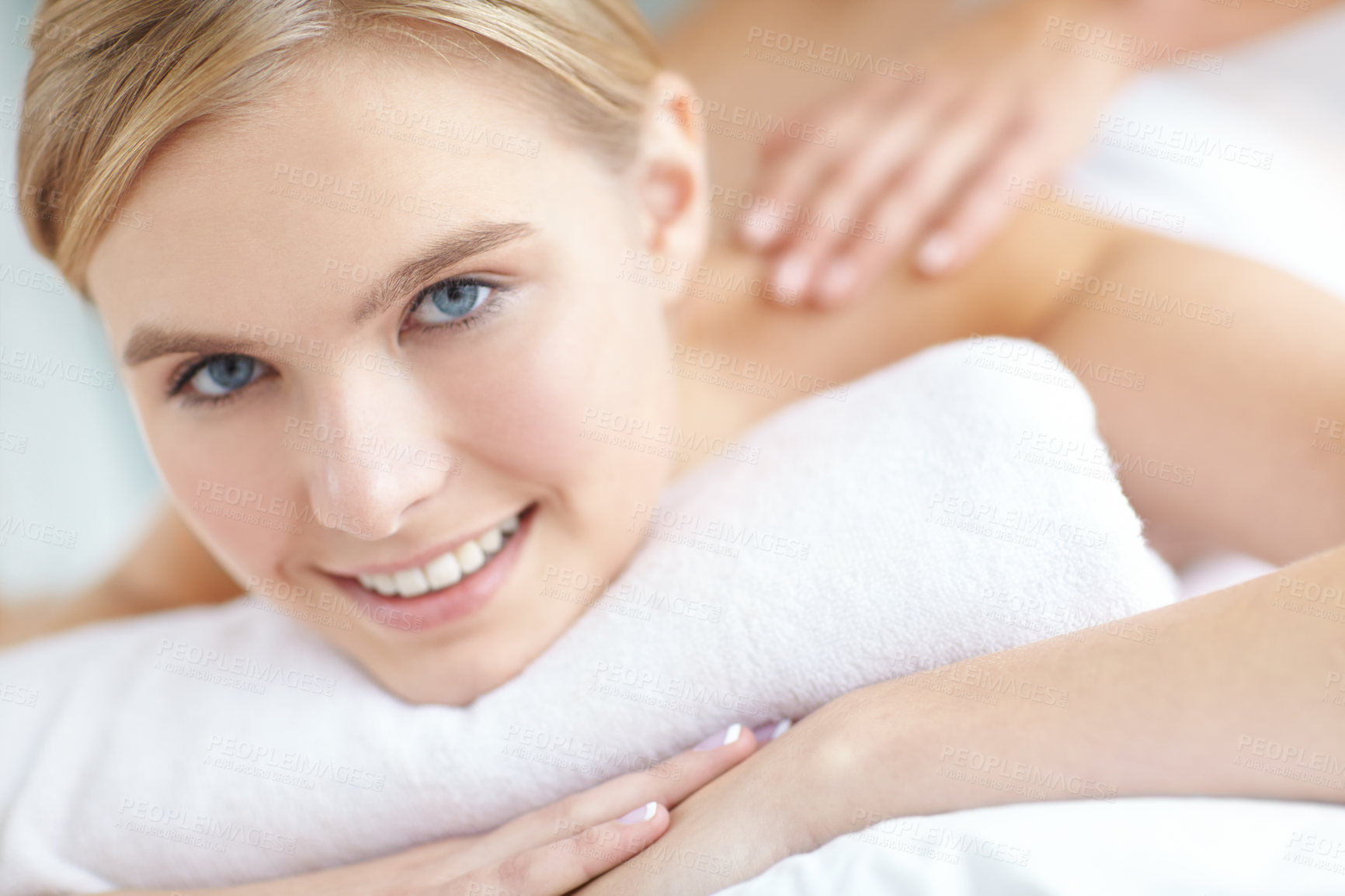 Buy stock photo Massage, relax and smile with portrait of woman at spa as customer on table for break, treatment or wellness. Luxury, pamper and satisfaction with face of person at salon for comfort or stress relief