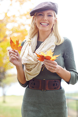 Buy stock photo Autumn, leaves and woman with portrait in nature for outdoor vacation, adventure or change of season. Environment, female person and happy with foliage in park for peace, holiday or travel in Denmark