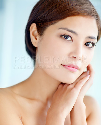 Buy stock photo Asian woman, portrait and feel for skincare, dermatology and beauty in studio with healthy skin. Female person, face and hygiene routine on blue background for facial treatment, self care and glow