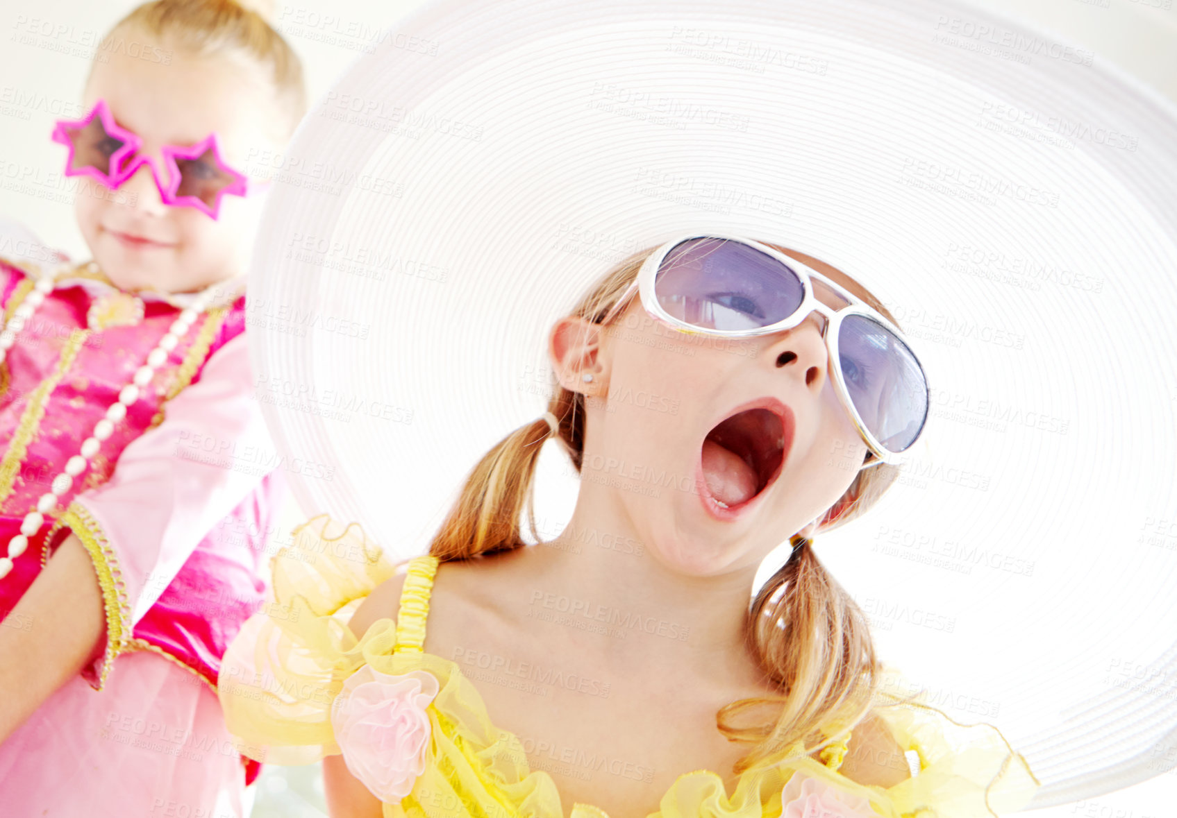 Buy stock photo Fancy, friends and children dress up in home with fun, glamour and confidence with sunglasses for character play. Princess, costume and happy girl kids with smile, fantasy and creative development.