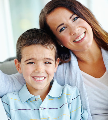 Buy stock photo Happy mom, child and hug on couch for love, support or care with bonding for childhood or weekend together at home. Portrait, mother and kid or son with smile for embrace or relax on living room sofa