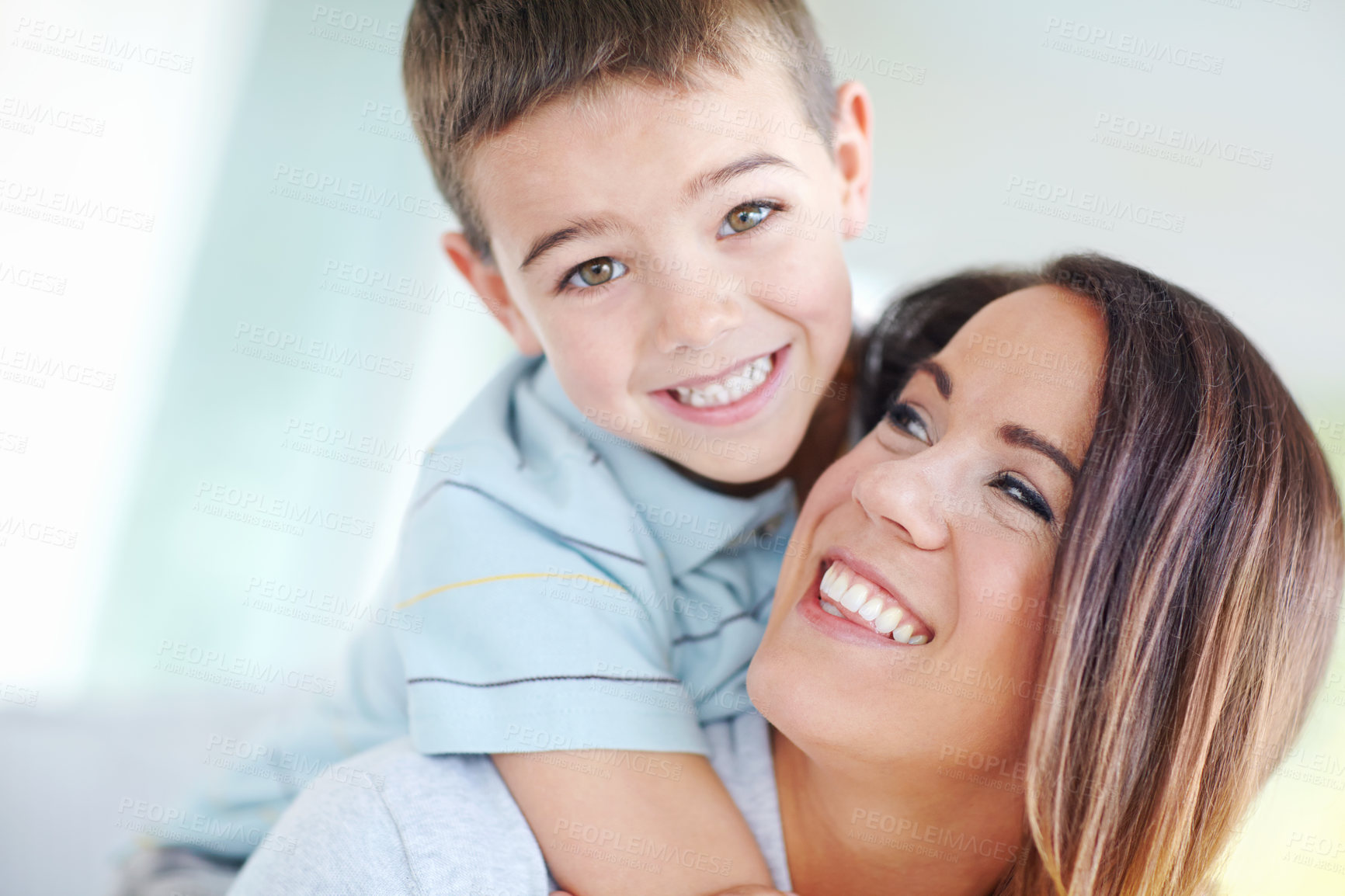 Buy stock photo Mom, son and hug on sofa for love, support or care with bonding for happy childhood or weekend together at home. Portrait, mother and kid or child with smile for embrace or relax on living room couch