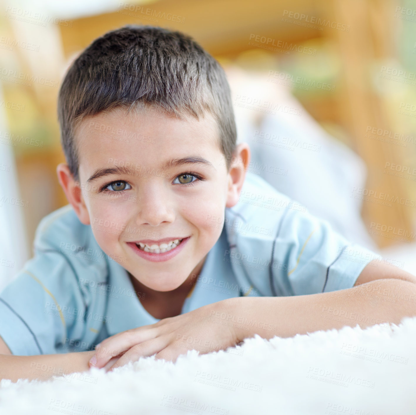 Buy stock photo Home, relax and portrait of kid on carpet for weekend enjoyment, break and satisfaction. Happy, boy and face of kid by mat on floor of house for wellness, development and peace with fun in morning