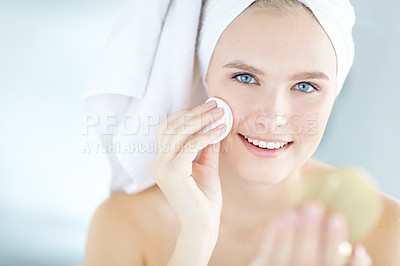 Buy stock photo Cotton, portrait and girl cleaning face for skincare, morning routine or dermatology in home bathroom. Mirror, happy woman or remove makeup with wipe for cosmetic, hygiene treatment or natural beauty