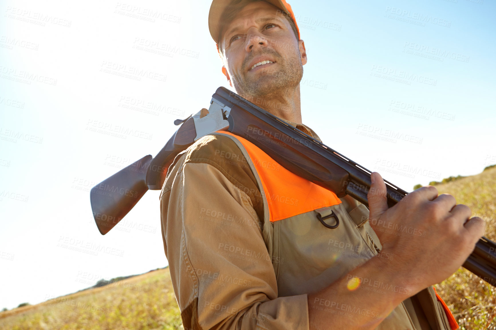 Buy stock photo Man, search and outdoor for hunting shotgun, rifle and stalking prey practice in nature. Mature person, camouflage and hunter sports in field for shooting in woods, thinking and tracking adventure