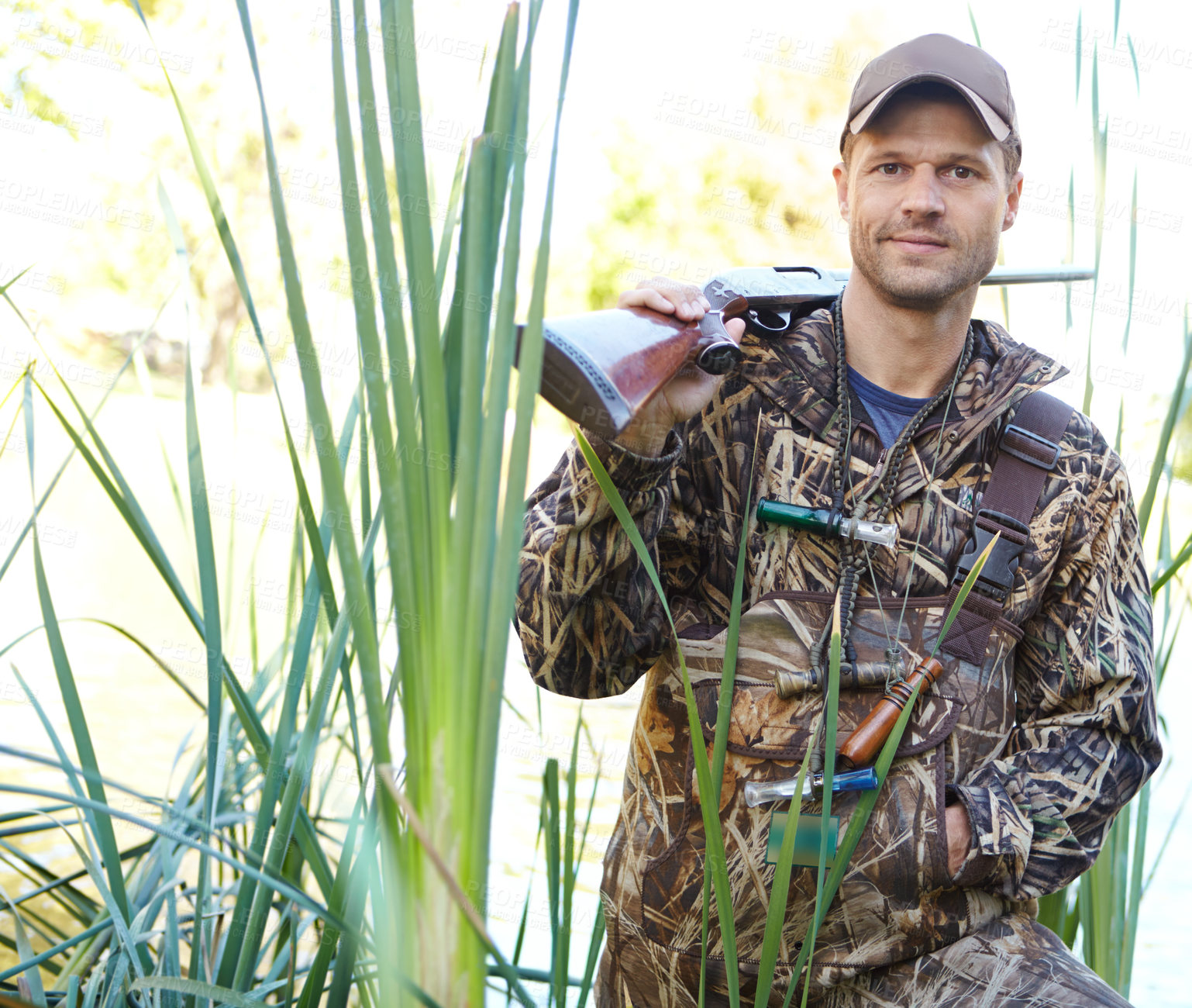 Buy stock photo Man, gun and portrait with gear outdoor for camouflage, hunting wildlife or adventure activity of nature safety. Male hunter, rifle and security for birdwatching, hobby and gaming target of survival