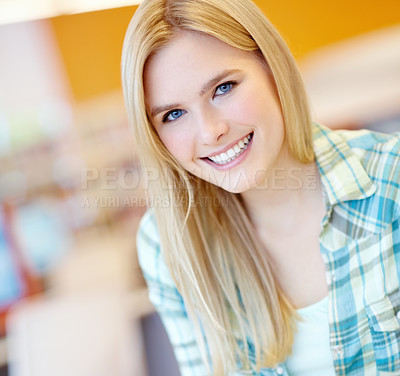 Buy stock photo Woman, portrait and happy for education as student in classroom with pride and satisfied in Germany. Female person, high school learner and smile in confidence at library for learning and studying