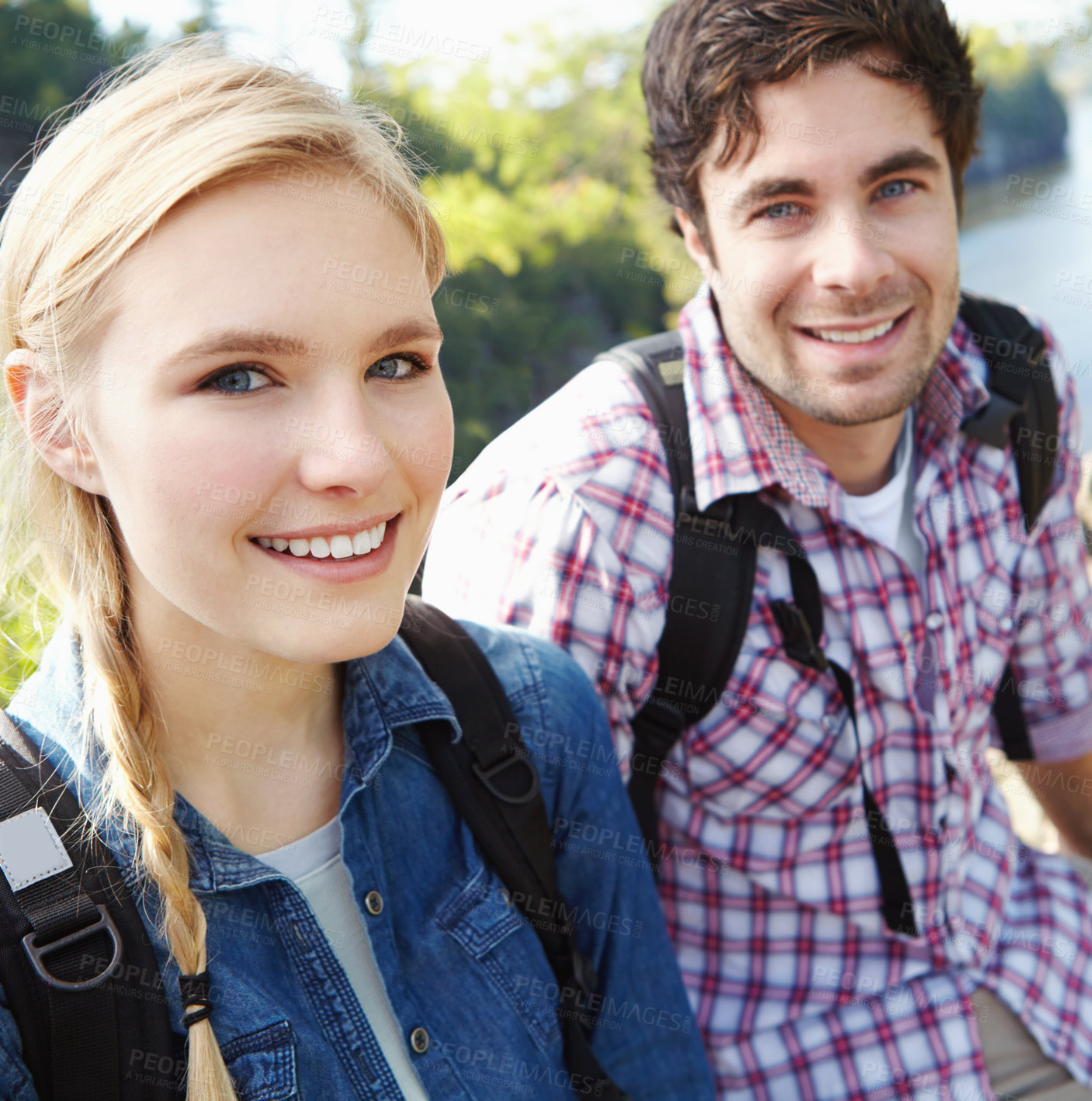 Buy stock photo Romantic, portrait or happy couple hiking in forest for travel, outdoor adventure or journey in nature. River, hikers or people in woods together on holiday vacation, trip or break to explore park