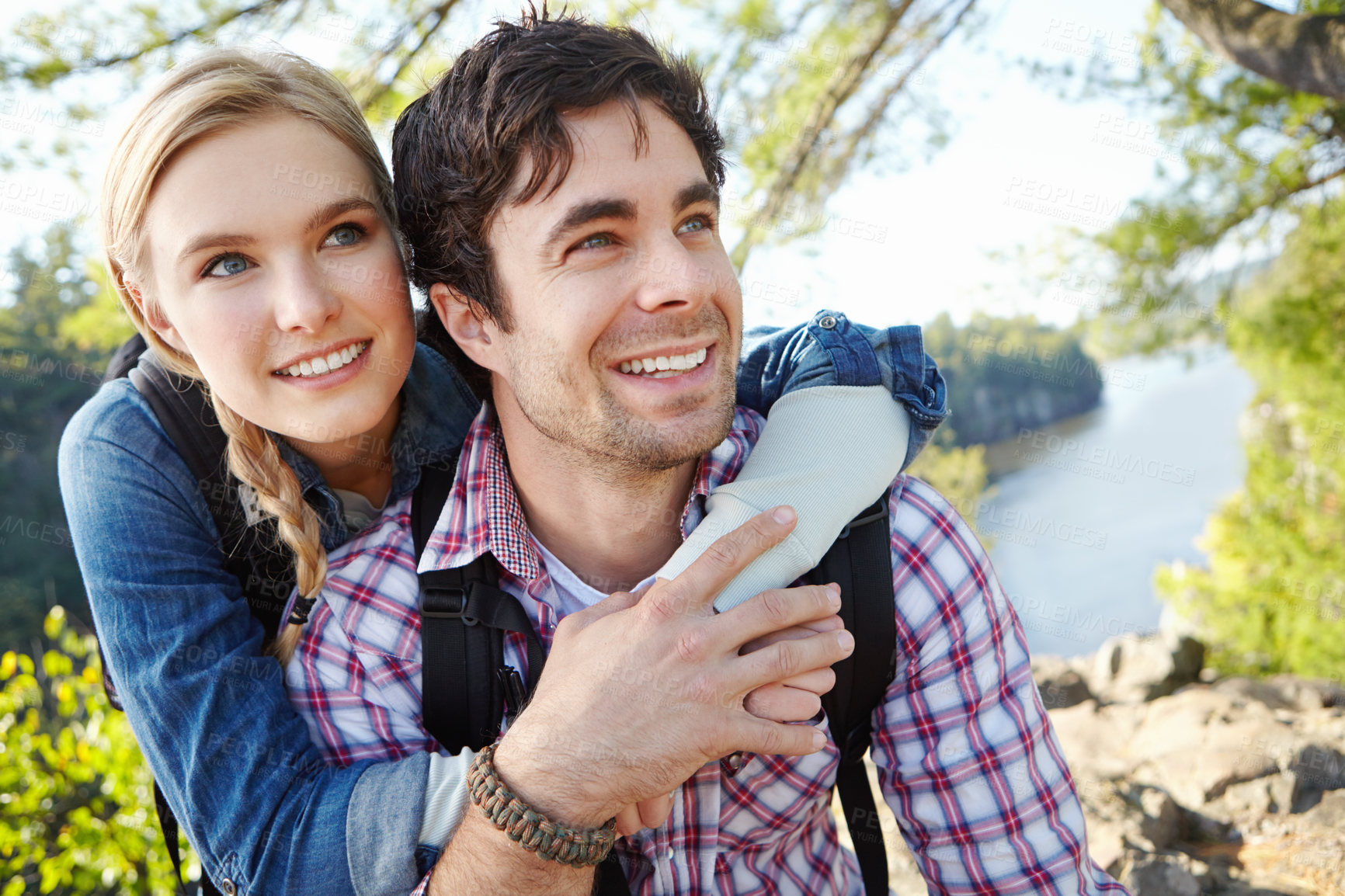 Buy stock photo View, hug and couple hiking in forest for travel, outdoor adventure or journey in nature together. Romantic, woods and people resting to relax on holiday vacation or trip to explore park for break