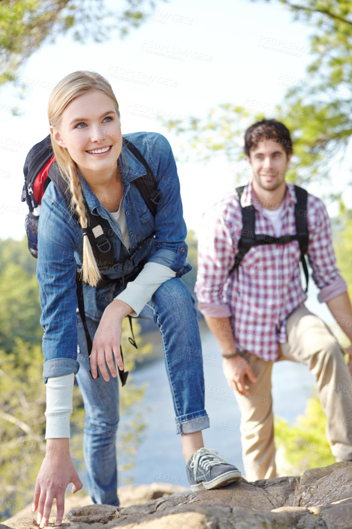 Buy stock photo Hiking, couple and thinking with woman by rocks for outdoor adventure, journey and travel together. Smile, man and happy with backpack by mountain for exploration, trekking and tourism in Argentina