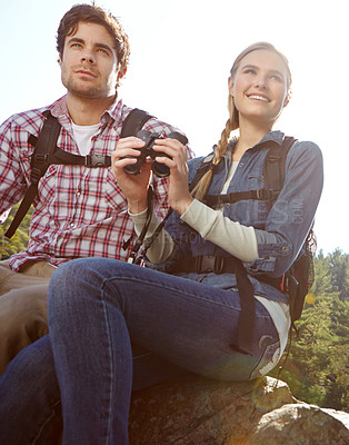 Buy stock photo View, binocular or happy couple hiking in mountain for travel or outdoor adventure in woods or forest. Birdwatch, relax or people sightseeing in nature on holiday vacation or break to explore park