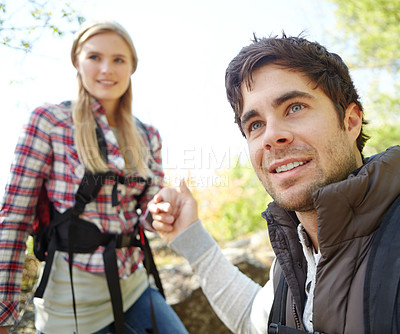 Buy stock photo Support, helping hand or couple in forest for romantic travel, outdoor adventure or journey. in nature. Love, trip or people in woods together on holiday vacation, mountain or break to explore park