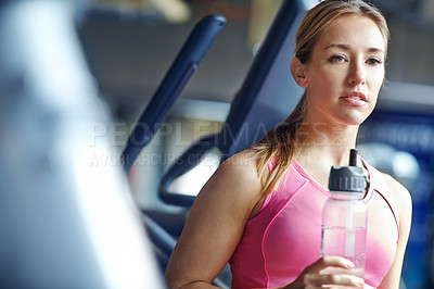 Buy stock photo Gym, woman and idea for fitness with water, liquid beverage and hydration for workout break. Training club, female person and thinking with bottle for mineral H2O, thirst and wellness for exercise