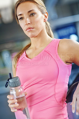 Buy stock photo Gym, woman thinking and exercise for fitness with water, liquid beverage and hydration for workout break. Training, female person and thoughts with bottle for mineral H2O, thirst or idea for wellness