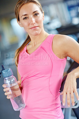 Buy stock photo Gym, woman portrait and exercise for fitness with water, liquid beverage and hydration for workout break. Training, female person and smile with bottle for mineral H2O, thirst and idea for wellness