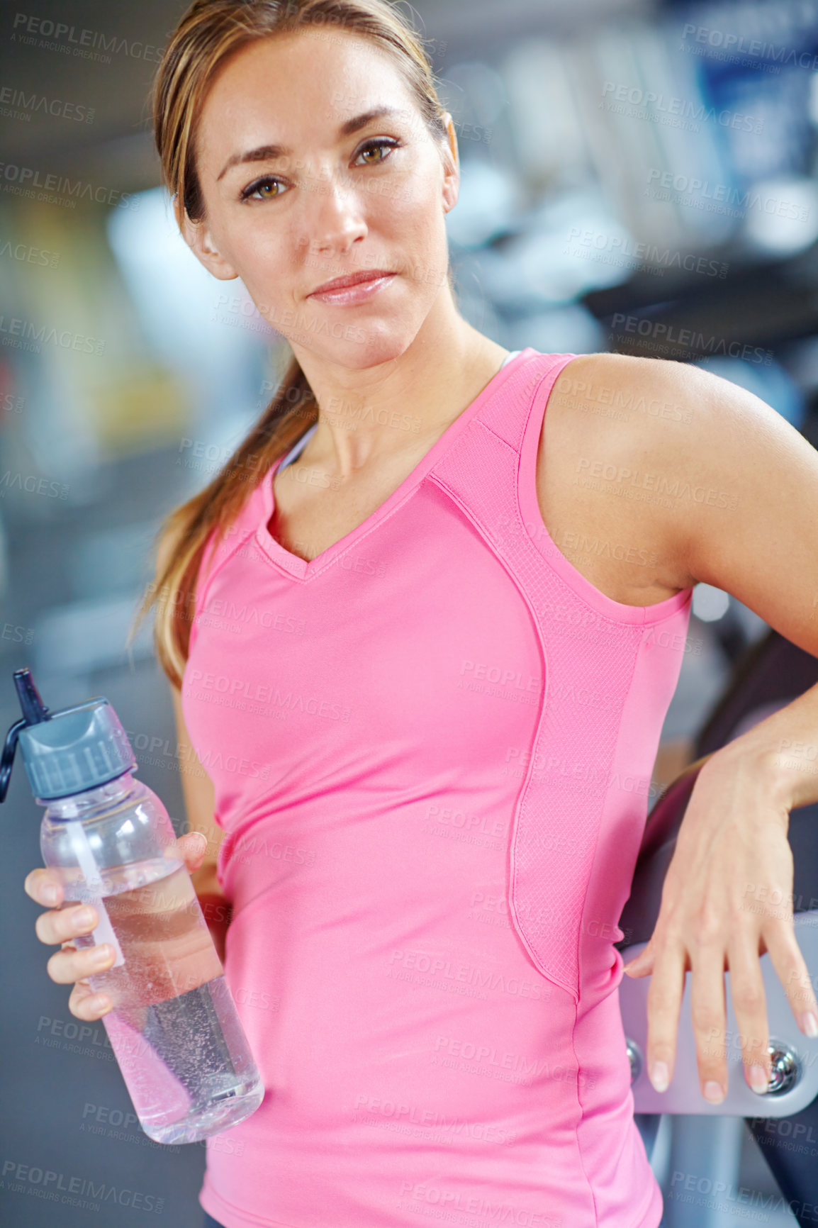 Buy stock photo Gym, woman portrait and exercise for fitness with water, liquid beverage and hydration for workout break. Training, female person and smile with bottle for mineral H2O, thirst and idea for wellness