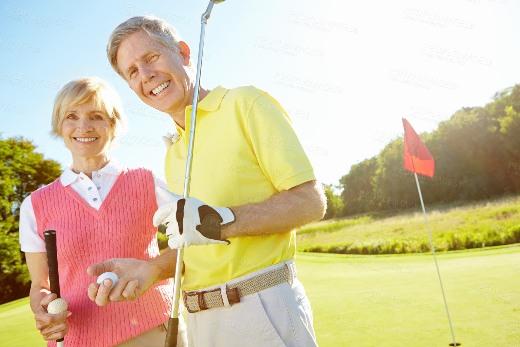 Buy stock photo Mature, portrait and happy couple with golf club for sports, game or friendly outdoor match together on grass field. Senior man, woman or golfers with smile for challenge, fitness or play in nature