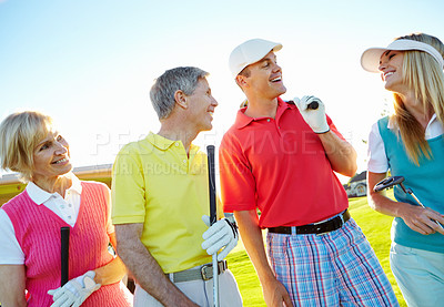 Buy stock photo A group of golfers comparing stories