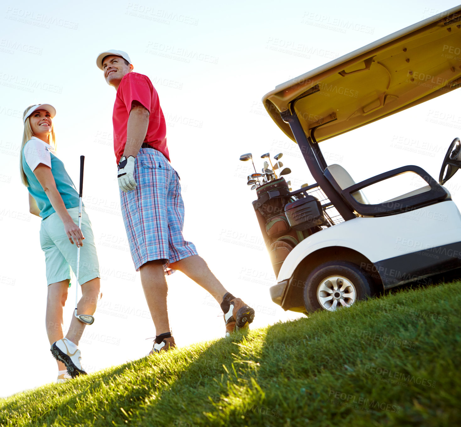 Buy stock photo Sports, thinking and couple on golf course for playing game, match and competition on grass. Golfer, low angle and man and woman outdoors for activity, fun and practice to relax on weekend in morning