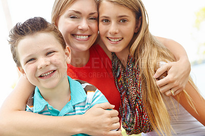 Buy stock photo Portrait, hug and mother with kids in park, love and bonding together with holiday, smile and adventure. Face, family and mama with children, embrace and cheerful with happiness, break and vacation