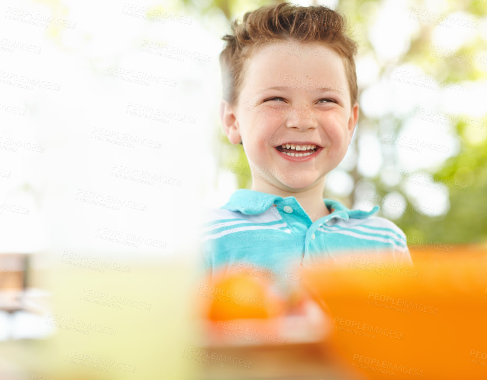 Buy stock photo Picnic, funny and boy with smile, park and happiness with weekend break, sunshine and laughing. Outdoor, kid and childhood with humor, joyful and joke with holiday, vacation and cheerful with nature