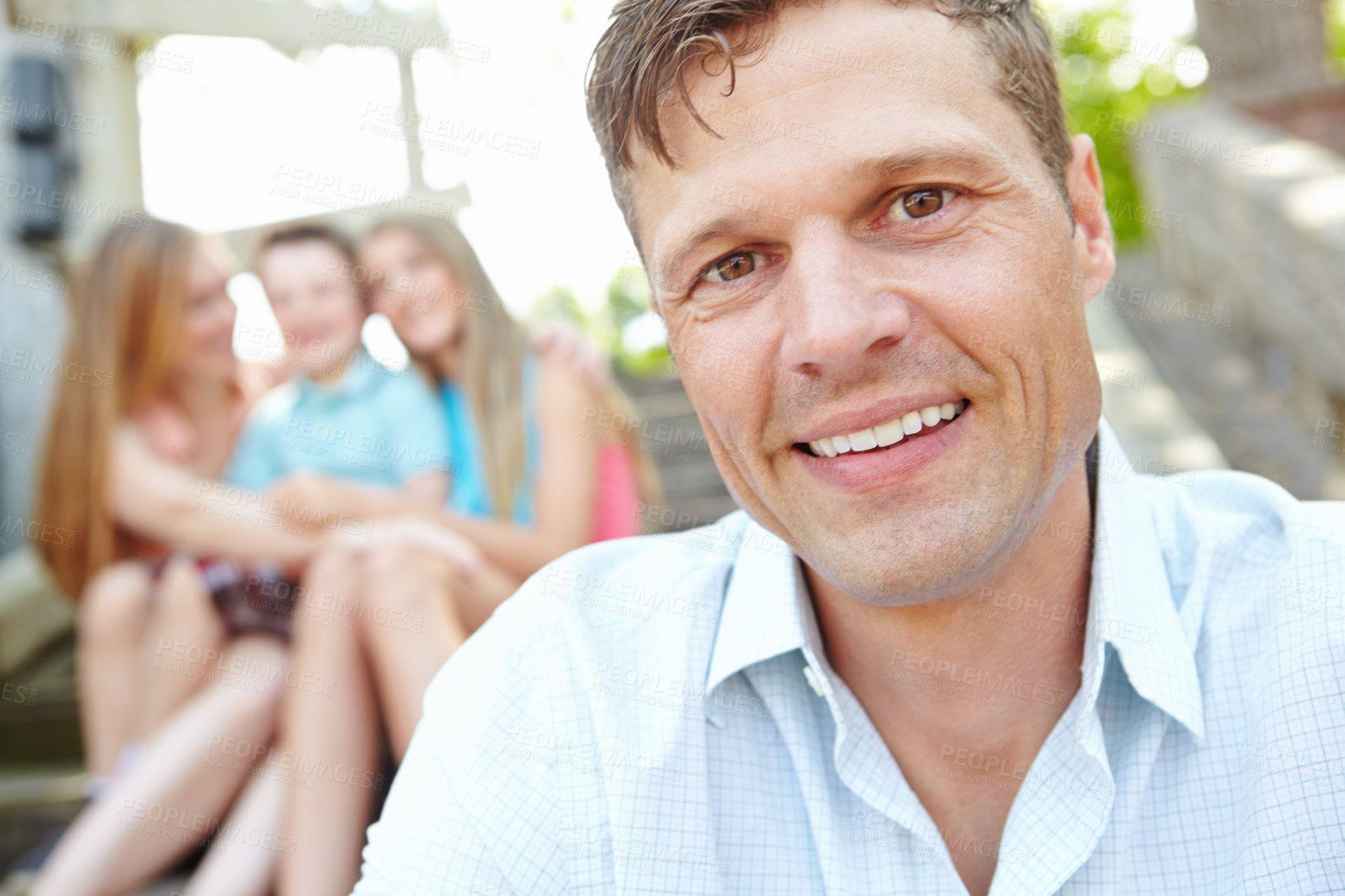 Buy stock photo Portrait, smile and man with family outdoor for summer vacation, relaxing and bonding together with love. Happy, father and holiday peace of travel with kids, woman and calm morning for weekend break